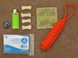 Survival Add-On with paracord, emergency blanket, firestarter, water purification, and compass