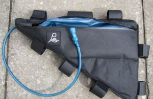 Hydration bladder fits in the left pocket or the right side compartment