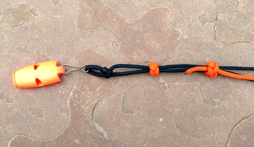 Paracord lanyard with whistle and adjusting ranger beads